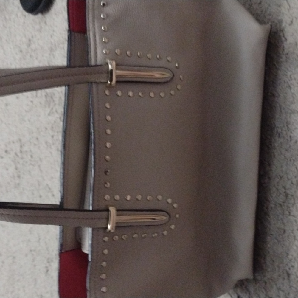 Large satchel with matching wristlet.